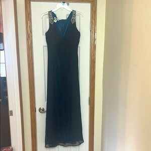 Elegant Black Sleeveless Dress with Embellished Straps